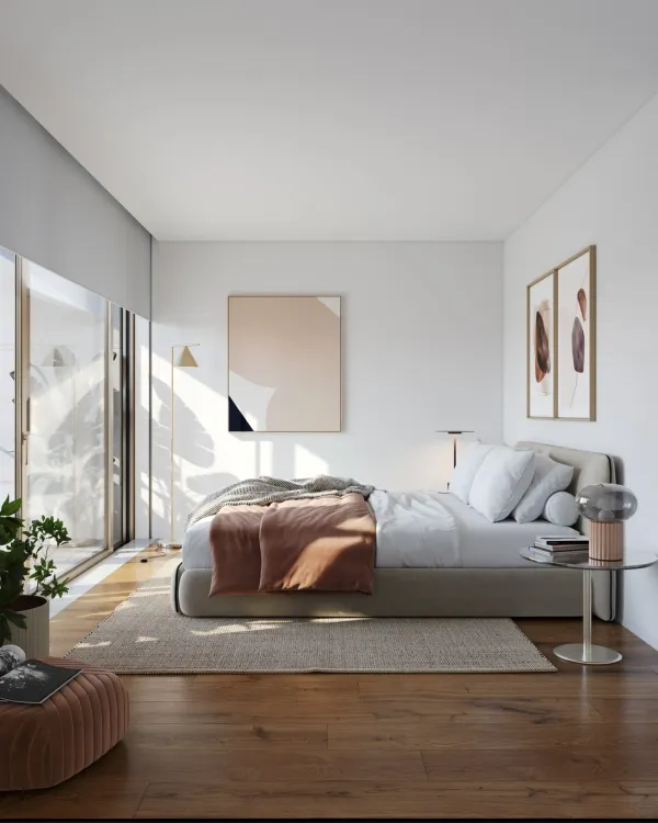 Quarto com cama de casal, janela ampla e zona de leitura