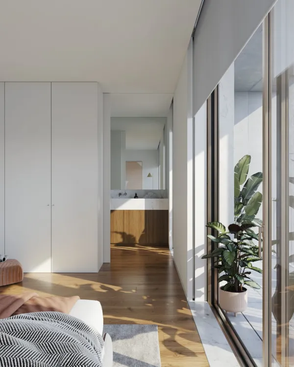 Quarto com envidraçado para o exterior e zona de banho ao fundo